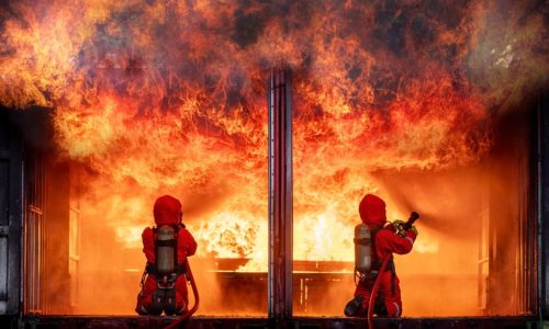 Firefighters safety using twirl water fog type fire extinguisher to fighting with fire from oil and